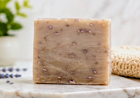 Patchouli sandalwood soap bar on marble surface