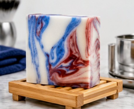 Clean Cut Clothesline soap bar on bamboo dish in barbershop setting