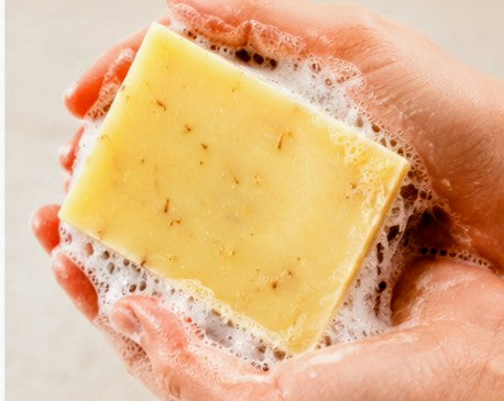 Lemongrass soap lathering in hands